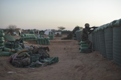 A soldier, part of the African Union Mission in Somalia, looks out over his position at an army base in El Baraf, Somalia (file photo).
