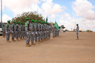 Officers from the Sierra Leonean contingent serving under the African Union Transition Mission in Somalia (ATMIS) mount a guard of honor during a familiarization visit by the new ATMIS Police Commissioner, Commissioner of Police Hillary Sao Kanu, to sector 6 in Kismayo, Somalia in March 2023.