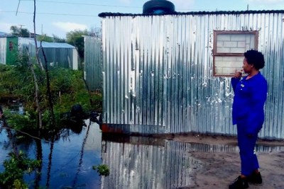 When she came back from nightshift Nkosiphendule Nzotho found her “shoes were swimming”. She lives in Gush’indoda informal settlement near Delft. Her shack is flooded and she has not been able to go to work for two days. “I might lose my job,” she said.