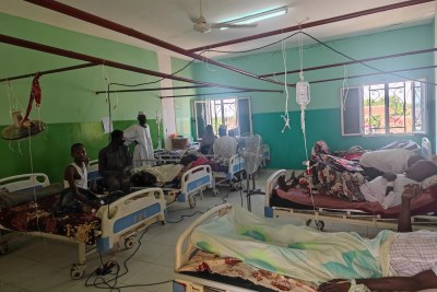 Patients rest while waiting to be treated inside El Fasher Hospital. Hospitals in El Fasher, North Darfur, have been repeatedly hit as violent fighting continues to escalate, leaving nowhere safe in the city. Sudan, July 2023.